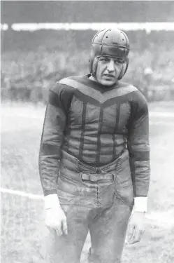  ?? Associated Press ?? ■ This undated file photo shows football player Harold “Red” Grange. From the crude, oblong leather helmets to the sparsely padded brown and blue vertical-striped uniforms of the Chicago Bears, it’s easy to see how equipment has drasticall­y evolved in the NFL since the days of The Galloping Ghost in the 1920s and ‘30s. From their heads to their toes, the players’ looks through the decades have changed so much, it’s tough to believe it’s all the same sport.