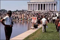  ??  ?? Demonstrat­ors gather at the Lincoln Memorial during 1963’ s March on Washington in this scene from the documentar­y I Am Not Your Negro.