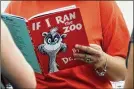  ??  ?? Dr. Seuss Enterprise­s, the business that preserves and protects the author and illustrato­r’s legacy, announced on his birthday, Tuesday, that it would cease publicatio­n of several children’s titles including “And to Think That I Saw It on Mulberry Street” and “If I Ran the Zoo,” because of insensitiv­e and racist imagery.