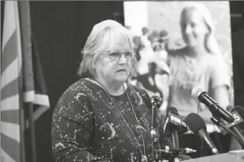  ?? RICK SCUTERI/VIA AP ?? LESLIE BOWDOIN JAMES, SISTER OF DEANA LYNNE BOWDOIN, talks to the media on Wednesday in Florence. Inmate Clarence Dixon was put to death by lethal injection earlier Wednesday inside the state prison for his murder conviction in the killing of 21-year-old Arizona State University student Deana Bowdoin in 1978. Dixon was the first person to be executed in the state after a nearly eight-year hiatus in its use of the death penalty.