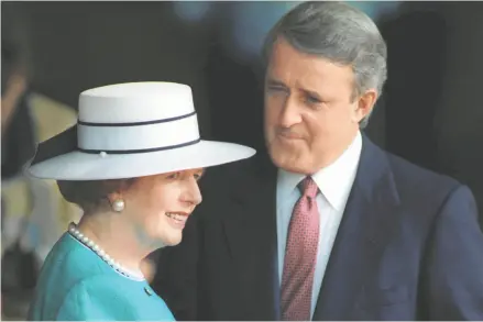  ?? JOHN MAHONEY / POSTMEDIA NEWS FILES ?? Brian Mulroney greets British PM Margaret Thatcher on her arrival in Toronto for the 1988 G7 Summit.