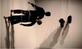  ?? Photograph: Martin Godwin/The Guardian ?? Walking on the Wall by Trisha Brown, performed at the Barbican in London in 2011.