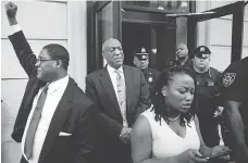  ?? MATT ROURKE / THE ASSOCIATED PRESS ?? Bill Cosby listens as a statement from his wife Camille is read aloud by Ebonee M. Benson outside the courthouse in Norristown, Pa., on Saturday.