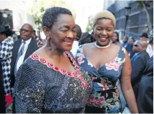  ??  ?? DAMSELS. Bathabile Dlamini, Minister of Social Developmen­t, and her daughter arrive for Sona 2019.