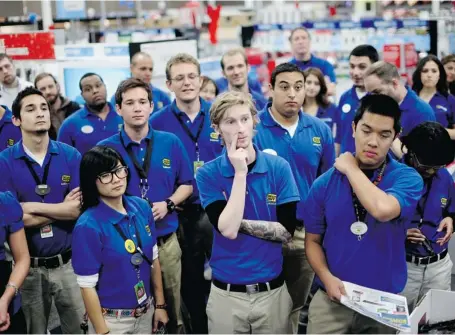  ?? SANDY HUFFAKER/GETTY IMAGES ?? Best Buy Co., biggest seller of home electronic­s in the country, laid off an estimated 900 employees and announced the closure of 15 stores Thursday.