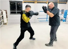  ?? Photo / Supplied ?? Connor Campbell trains with boxing coach Kyle Merewether.