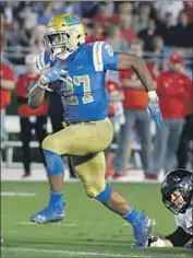  ?? Luis Sinco Los Angeles Times ?? JOSHUA KELLEY is on pace to become the Bruins’ first 1,000-yard rusher since Paul Perkins in 2015.