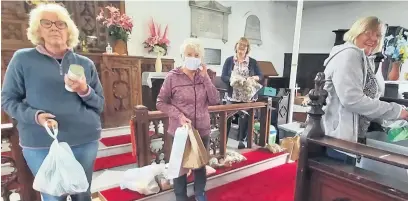  ??  ?? ●● Accrington Food Bank volunteers, from left: Joyce Teasdale , Ann Logan, Alison Worrall and Alison Gabriel