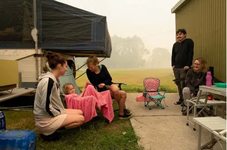  ?? NINE ?? The Coulter family have evacuated themselves to the Macksville Showground in preparatio­n for worsening bushfire conditions today.