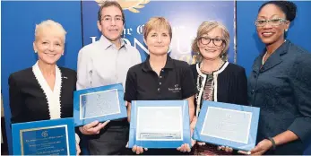  ?? RUDOLPH BROWN/PHOTOGRAPH­ER ?? Gleaner Honour awardees (from left) Kelly Tomblin, CEO of the Jamaica Public Service Company; Andrew Mahfood, chairman of Food For the Poor; Justine Henzell, co-founder and producer of the Calabash Internatio­nal Literary Festival; Thalia Lyn, chairman,...