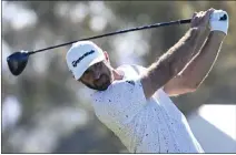  ?? DENIS POROY – THE ASSOCIATED PRESS ?? Two-time winner Dustin Johnson will defend his championsh­ip at the Asian Tour's Saudi Internatio­nal this week in Economic City, Saudi Arabia.