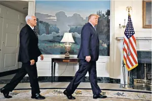  ??  ?? Donald Trump at the White House yesterday with vice-president Mike Pence, to make a statement on Syria