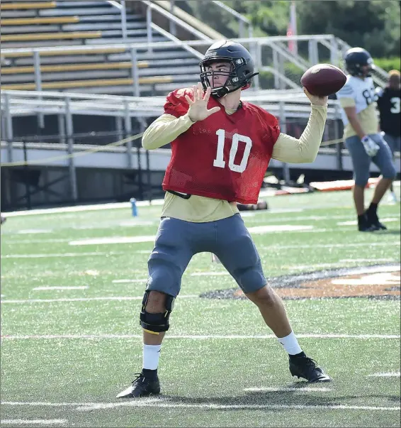  ?? Photos by Ernest A. Brown ?? Bryant transfer quarterbac­k Gage Moloney (10) spent four seasons at James Madison and went to a pair of national title games, but he came to Bryant to earn his MBA and start for an FBS team. Moloney is tasked with igniting the offense after a difficult spring campaign.