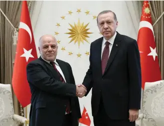  ??  ?? Turkish President Recep Tayyip Erdogan meets with Iraq’s Prime Minister Haider Al-Abadi at the Presidenti­al Palace in Ankara on Wednesday. (Reuters)