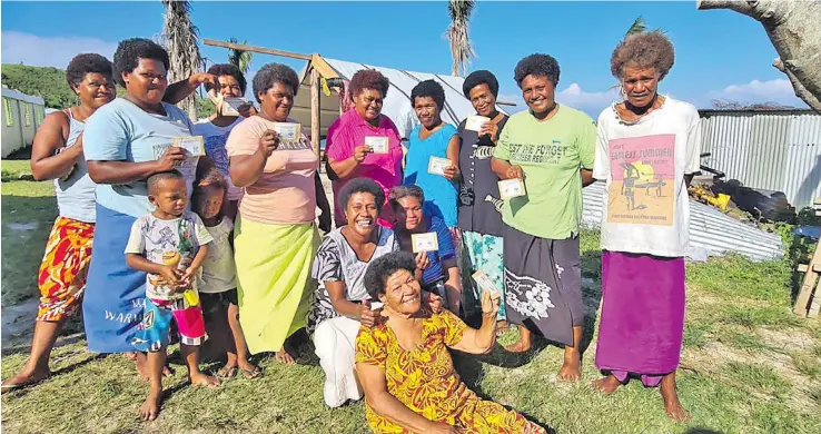  ?? Photo: Sampras Anand ?? Women of Yaro Village after receiving their cash assistance by Adventist Developmen­t and Relief Agency (ADRA Fiji) on April 13, 2021.