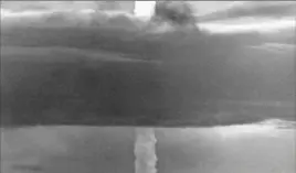  ?? Associated Press ?? The stem of a hydrogen bomb moves upward through a heavy cloud and comes through the top of the cloud, after the bomb was detonated over Namu Island in the Bikini Atoll, Marshall Islands, May 21, 1956.