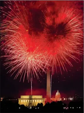  ?? AP/JOSE LUIS MAGANA ?? Fireworks explode Wednesday over the Lincoln Memorial, the Washington Monument and the U.S. Capitol along the National Mall in Washington during the Fourth of July celebratio­n.