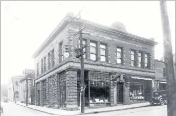  ?? SUBMITTED BY CLYDE MACDONALD OF THE PICTOU COUNTY ROOTS SOCIETY ?? The Chambers building in New Glasgow, shown here in 1930, at the corner of Provost and Forbes streets, was built in 1910 by contractor John J. Grant. At a later point it was home to The Evening News. The building has wreaths above the front entrance...