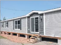  ?? ALYSHA CAMPBELL/JOURNAL PIONEER ?? Matt Darrach and his crew have built eight energy efficient mini-homes since April of this year, and have plans to build net-zero, self-sufficient homes next year.