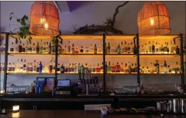  ?? DOUGLAS ZIMMERMAN — MARIN INDEPENDEN­T JOURNAL ?? The bar at Zalta in Sausalito.
Prices: Reservatio­ns: Summary: