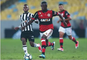  ??  ?? debut...Vinicius came off the bench against Atletico Mineiro