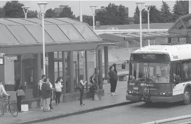  ?? FILES ?? Commuters wait at the OC Transpo’s St. Laurent station. The city needs a better plan to help low-income people.