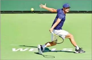  ?? AFP ?? Miomir Kecmanovic of Serbia hits a backhand return to Matteo Berrettini of Italy in their Round 4 match at the Indian Wells tennis tournament on Wednesday.