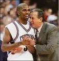  ?? Doug Mills / Associate Press ?? UConn’s Richard Hamilton gets a hug from coach Jim Calhoun at the end of the game aganist Indiana in 1998.