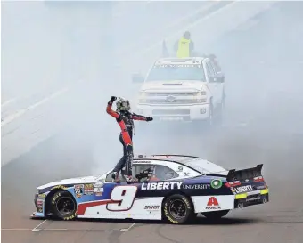  ?? DANIEL SHIREY, GETTY IMAGES ?? William Byron celebrates after winning the Xfinity Series race Saturday at Indianapol­is Motor Speedway, the 19-year-old’s third victory in the circuit’s last five races.