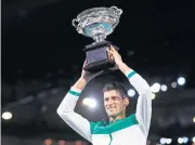  ?? REUTERS ?? Novak Djokovic lifts the trophy after his win at the Australian Open in February.