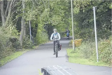  ?? PICTURE: GREG MACVEAN ?? The Roseburn cycle path is set to disappear to make way for Edinburgh’s north-south tram extension, however the plan has sparked opposition over the loss of a green active travel corridor