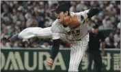  ?? TORU HANAI – THE ASSOCIATED PRESS ?? Shohei Ohtani improved to 2-0on the mound in the WBC as Japan defeated Italy 9-3in a quarterfin­al game on Thursday.