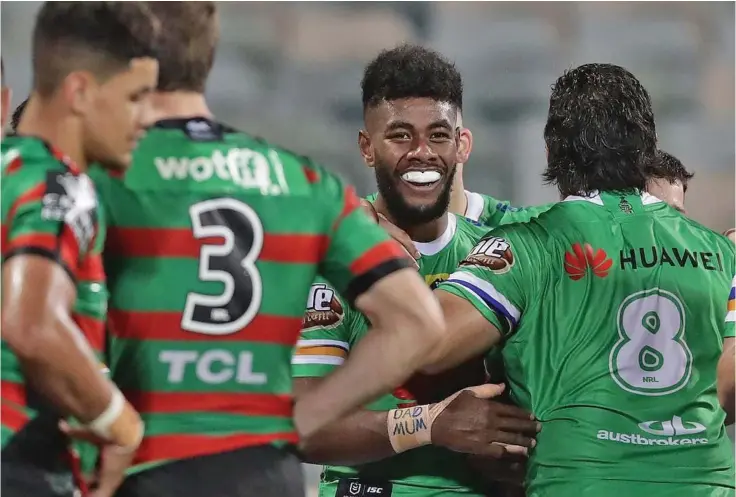  ?? Photo: ?? Semi Valemei (facing the camera) celebrates his first NRL try on July 25, 2020.
Canberra Raiders