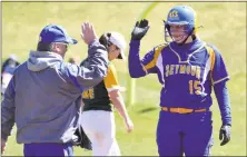  ?? Pete Paguaga / Hearst Connecticu­t Media ?? Seymour’s Kolby Sirowich, right, high fives coach Ken Pereiras after reaching third base on Saturday.