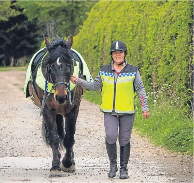  ?? Picture: Steve MacDougall. ?? Above: Eileen Reid, who captured the footage on her helmetcam, with horse Sam.