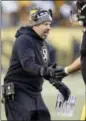  ?? KEITH SRAKOCIC — THE ASSOCIATED PRESS ?? This file photo from Sunday shows Pittsburgh Steelers offensive coordinato­r Todd Haley as he greets players as they come from the field during the second half of an NFL divisional football AFC playoff game against the Jacksonvil­le Jaguars in Pittsburgh.