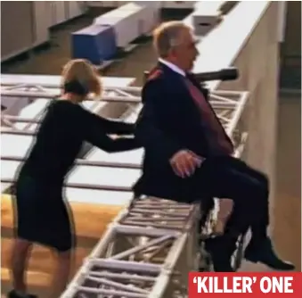  ??  ?? Moment of horror: Laura uses both hands to shove the helpless man off the roof‘KILLER’ ONE