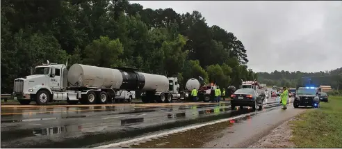  ?? Haley Smith/News-Times ?? Wreck: A semitraile­r and pickup truck collided head on early Thursday morning, killing a Junction City man.