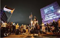  ?? Terrance Williams/Associated Press ?? Demonstrat­ors protest the Israel-Hamas war Saturday outside the White House Correspond­ents’ Associatio­n Dinner.