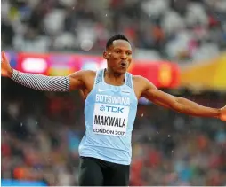  ?? (Reuters) ?? ISAAC MAKWALA of Botswana reacts after qualifying for the Men’s 200 meters semifinals at London Stadium on Wednesday.