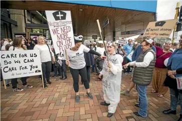  ?? VIRGINIA WOOLF/STUFF ?? Nurses across New Zealand have indicated they will strike if their demands for better pay and working conditions are not met.