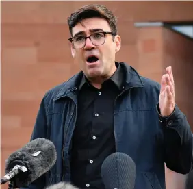  ??  ?? Greater Manchester mayor Andy Burnham speaks to the media yesterday