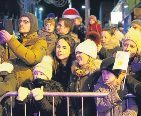  ??  ?? BROUGHTY Ferry’s Christmas lights switch-on attracted thousands of people for an evening of entertainm­ent, food and drink.
Santa and stars from the Disney hit Frozen welcomed the crowds to the street party. The cartoon princesses were not the only...