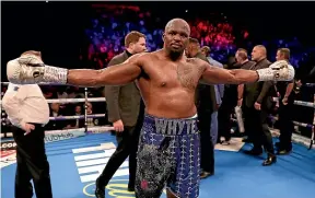  ?? GETTY IMAGES ?? Dillian Whyte celebrates his win over Dereck Chisora after a bruising heavyweigh­t bout in London.