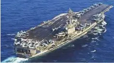  ?? Reuters ?? USS Carl Vinson sails offshore Nagasaki prefecture, southern Japan, yesterday. The US aircraft carrier group later began exercises with South Korean navy near the Korean peninsula.