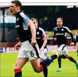  ??  ?? ON THE RUN: O’Dea leads the celebratio­ns after his equalising penalty