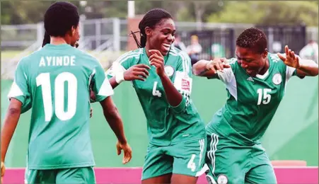  ??  ?? Halimat Ayinde (left) watching Asisat Oshoala(centre) and Ugo Njoku doing the Ebola dance during the Under-20 World Cup final...last year