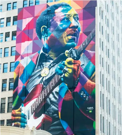  ?? ASHLEE REZIN GARCIA/ SUN-TIMES ?? LEFT: In 2017, this 10-story mural of late-great Chicago bluesman Muddy Waters was dedicated in advance of the city’s annual Blues Festival. The painting is at 17 N. State St.