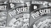  ?? Joe Raedle
Getty Images ?? MICROWAVE POPCORN is a product that still incorporat­es a large amount of trans fats.