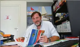  ??  ?? Loïc Bonnet dans son bureau de l’agence Dream Yacht Charter, installée sur le port du Marin, en Martinique.